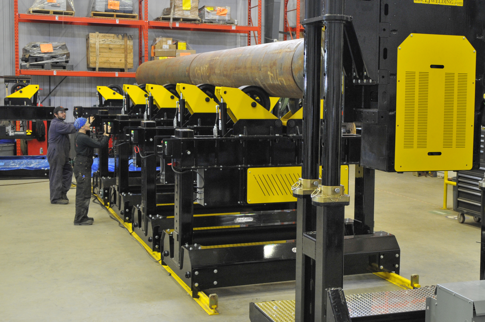 pipe and vessel material handling system for multi-purpose fabrication shops