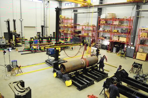 welding manipulator with pipe turning rolls