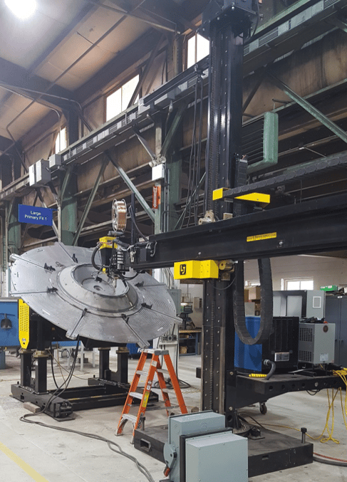 welding positioner with column boom manipulator