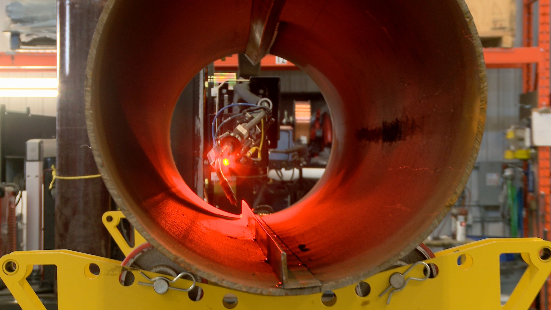 laser seam tracking on a column and boom manipulator.