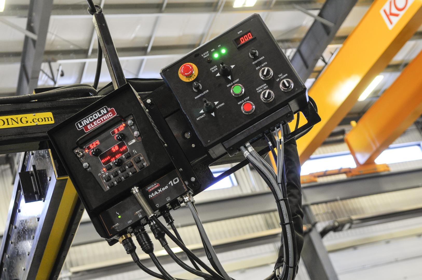 close up of lincoln boom mounted controls for CaB welding system.